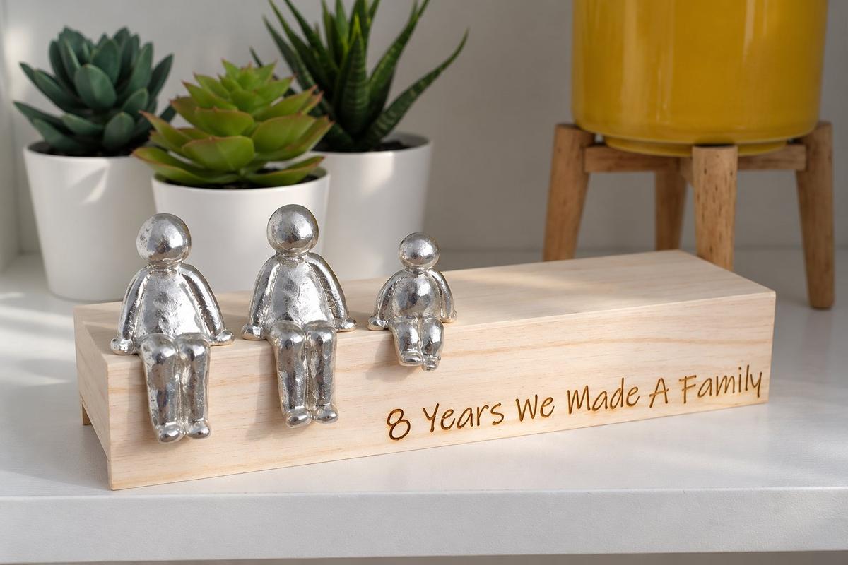8th bronze wedding anniversary gift — handmade bronze family sculpture with personalised figurines, made in Cornwall